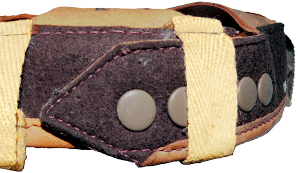 Têtes des pressions femelles (coiffe à feutre gris).