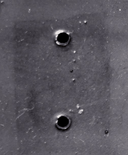 Vu de l'intérieur et traces de la contre-plaque.