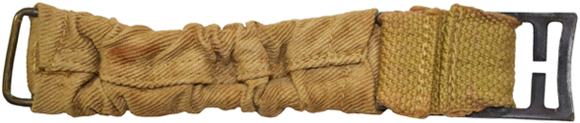 Partie courte avec boucle de réglage (envers/revers). Partie courte avec boucle de réglage (envers/revers).