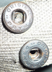 Détail bouton pression. Détail bouton pression.