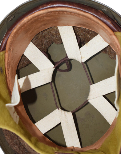 Coiffe constituée d'une suspension de type Riddel.