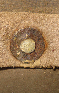 Point de fixation sommital.