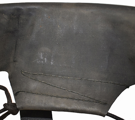 Détails couture patte de coiffe. Détails couture patte de coiffe.