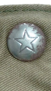 T&ecirc;te bouton pression.