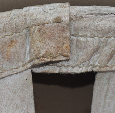 Jointure coiffe en cuir.