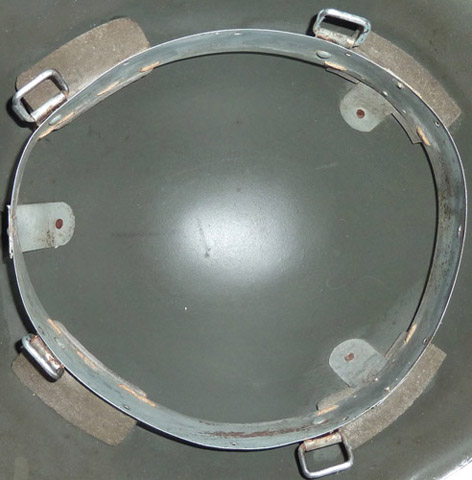 Cerclage fixé en trois points.