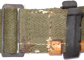 Boucle de r&eacute;glage du bandeau de sudation.