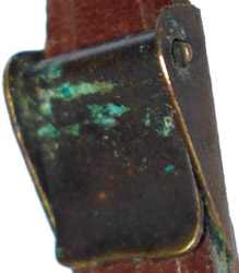 Boucle de r&eacute;glage &agrave; clapet.