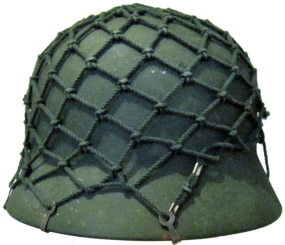 Arrière. Noter le sertissage du cordon de fixation.