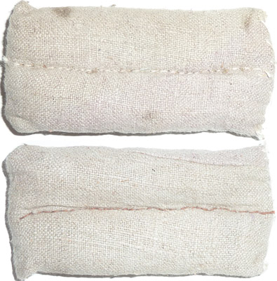 Coussinet rembourré de crin de cheval. Coussinet rembourré de crin de cheval.