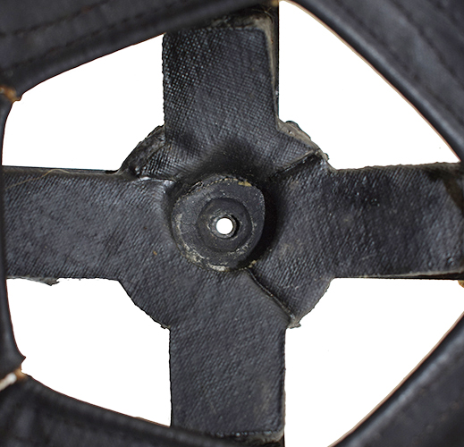 Tampon amortisseur cruciforme.