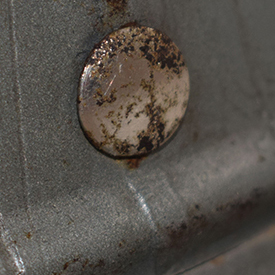 Tête de rivet avant ou arrière.