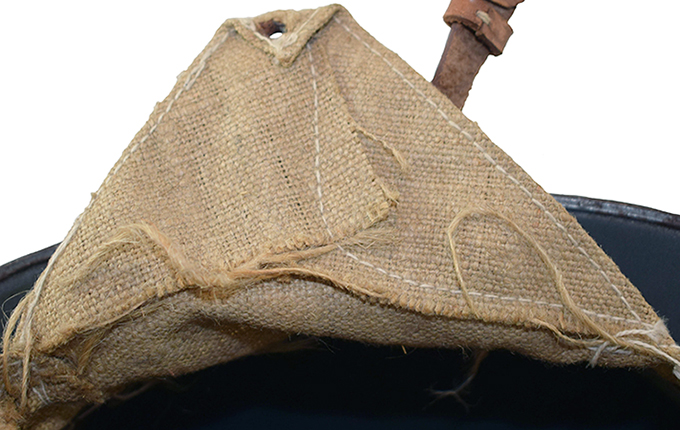 Revers patte de coiffe.