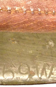 Marquage estampé : 69W. Marquage estampé : 69W.