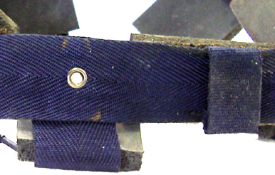 Détail, œillet de fixation.