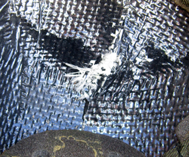 Gros plan, le projectile n'a pas traversé.