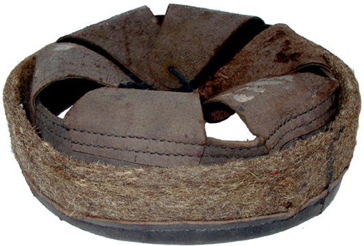 Coiffe repliée (verso).