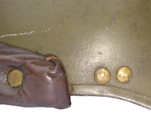 Tête du rivet du bourrelet et jonction du jonc (fabrication Luchaire).