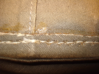 Couture périphérique normalement cachée par le bourdalou.