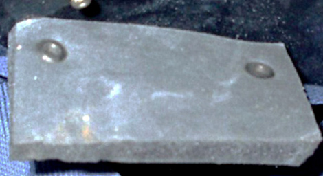 Tampon amortisseur latéral (verso). Tampon amortisseur latéral (verso).