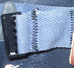 Boucle de réglage de la nuquière. Boucle de réglage de la nuquière.