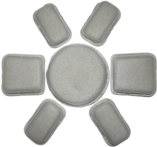 Sept pads constituant la coiffe (2 trapézoïdaux, 4 oblongs et un rond). Sept pads constituant la coiffe (2 trapézoïdaux, 4 oblongs et un rond).