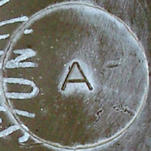 Lettre gravée cerclée, A.
