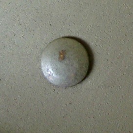 Rivet plat du bouton de jugulaire.