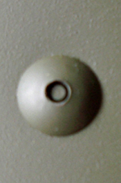 Ecrou en place, verni V.A.