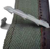 Pince-ressort de fixation.