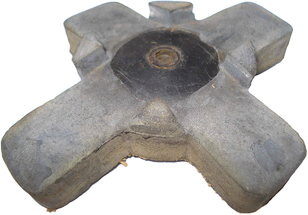 Tampon amortisseur cruciforme (envers/revers). Tampon amortisseur cruciforme (envers/revers).