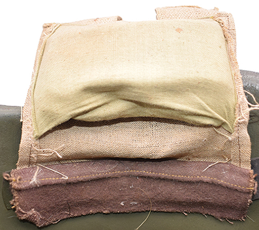 Revers avec compartiment de rembourrage.