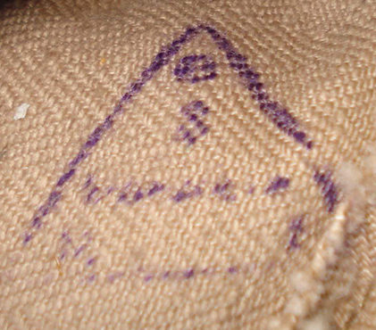 Tampon de contr&ocirc;le triangulaire.