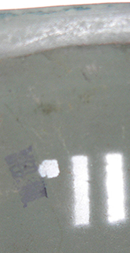 Indication de taille en chiffre romain.