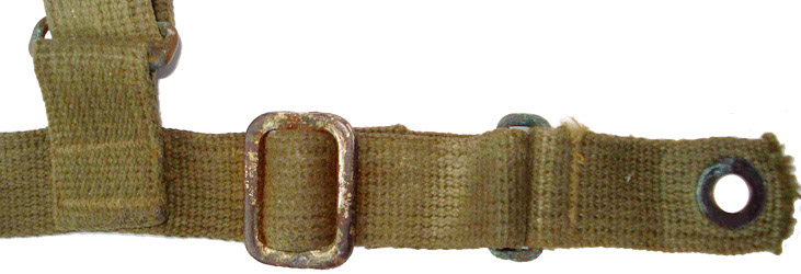 Passant lat&eacute;ral et boucle de r&eacute;glage.