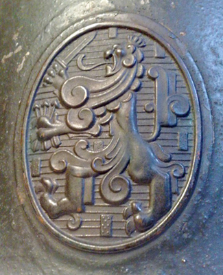 Insigne, peinture vert fonc&eacute; granit&eacute; - 1927-1929.