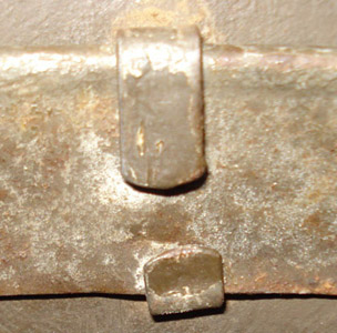 Point de fixation latéral.