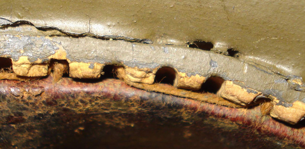 Fixation de la coiffe par couture. Fixation de la coiffe par couture.