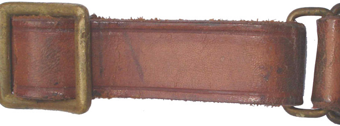 Jugulaire et boucle de réglage.