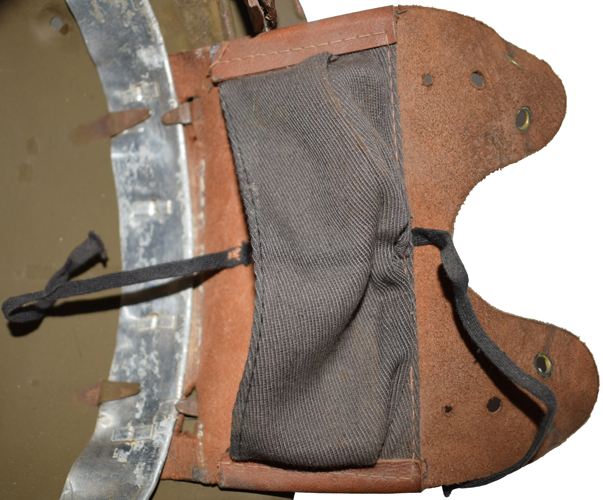 Compartiment de rembourrage, fermeture par lacet.