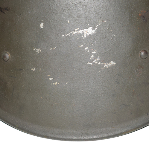 Trace de l'insigne hollandais retiré.