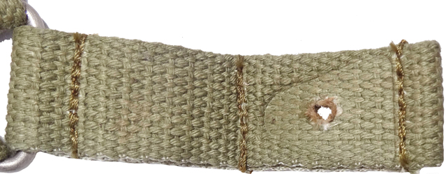 Boucle à double passant de réglage. Vue en détails d'un passant latéral.