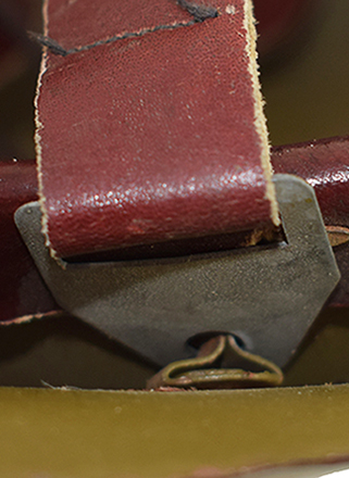 Passant retenu aux points latéraux.