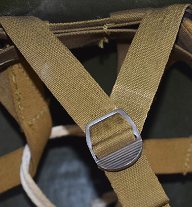 Système en V avec boucle coulissante.