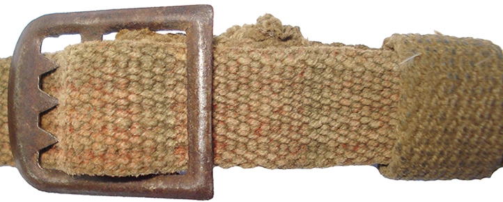 Boucle coulissante crantée.