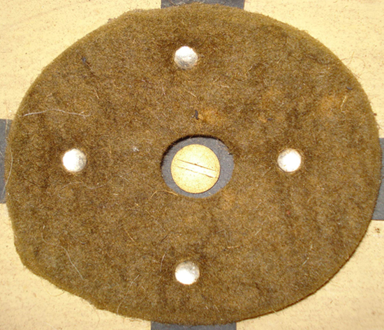 Tampon de fond de coiffe en feutre marron. Tampon de fond de coiffe en feutre marron.