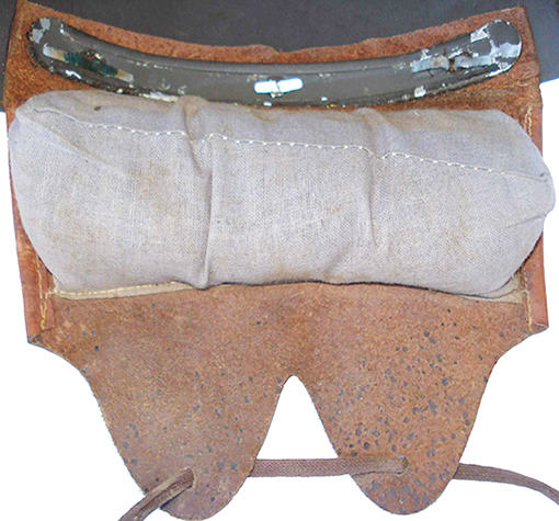 Revers avec compartiment de rembourrage.