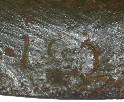 Marquage estampé (utilité inconnue). Marquage estampé (utilité inconnue).