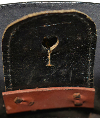 Boutonnière de maintien.