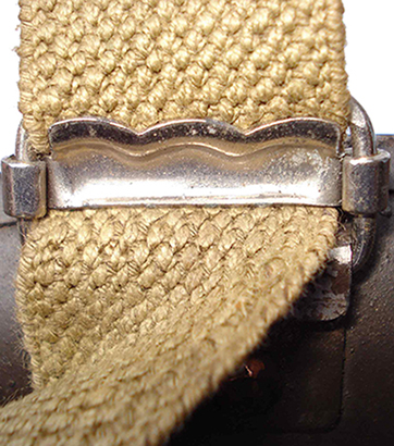 Détails maintien boucle coulissante.